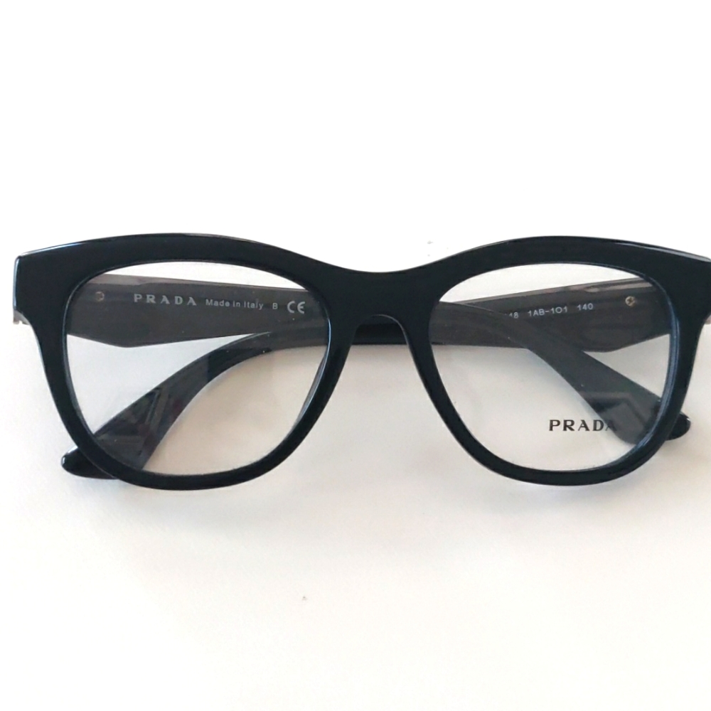Prada 04QV Glasses. 51-18-140. Black